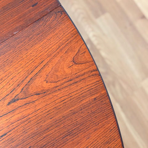 Danish round dining table in Santos rosewood