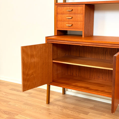 Swedish bookshelf with pull out desk in teak wood