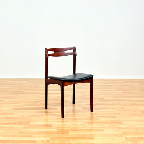 Danish dining chairs in Santos rosewood by Erik Buch