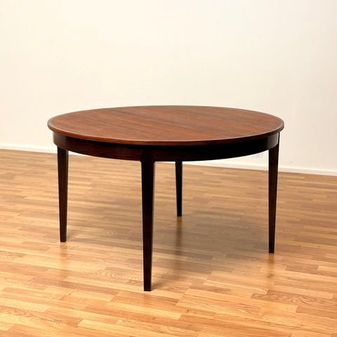 Danish round dining table in Santos rosewood