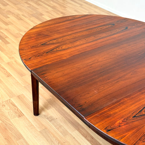 Danish round dining table in Santos rosewood