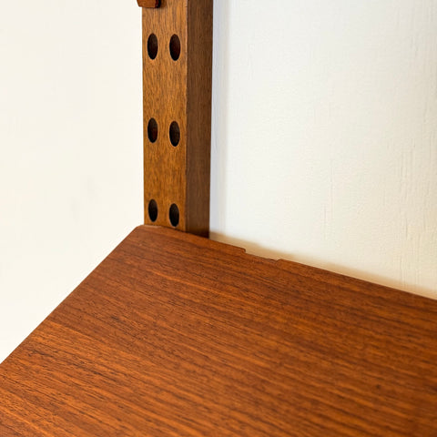 Danish wall unit / shelving system in walnut by Poul Cadovius