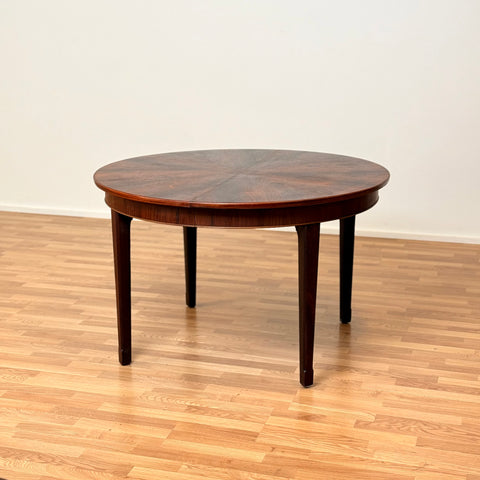 Danish round dining table in Santos rosewood