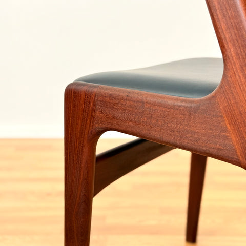 Danish dining chairs in walnut by Kai Kristiansen