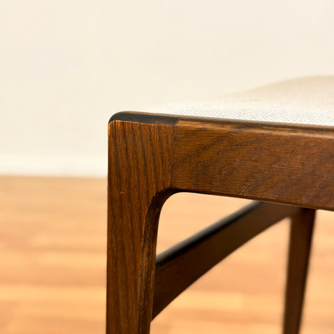 Danish dining chairs in solid stained oak by Erik Buch