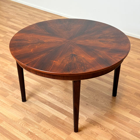 Danish round dining table in Santos rosewood