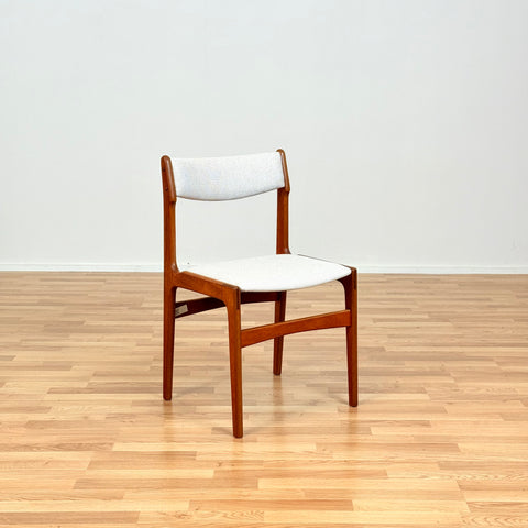 Danish dining chairs in teak by Erik Buch