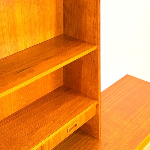 Reserved Swedish bookshelf with writing desk in teak