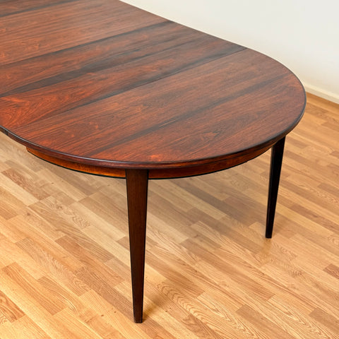 Danish large round dining table in Santos rosewood by Oman Junn