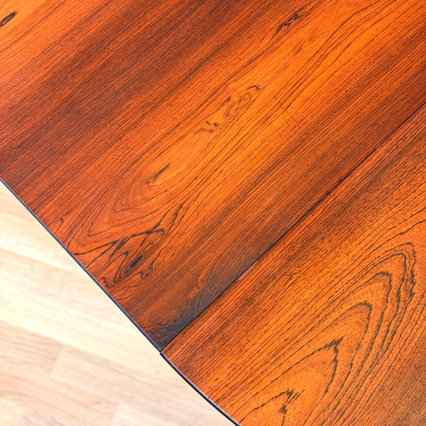 Danish round dining table in Santos rosewood