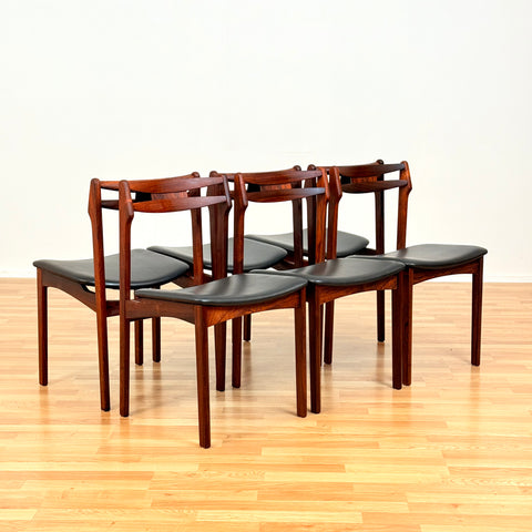 Danish dining chairs in Santos rosewood by Erik Buch