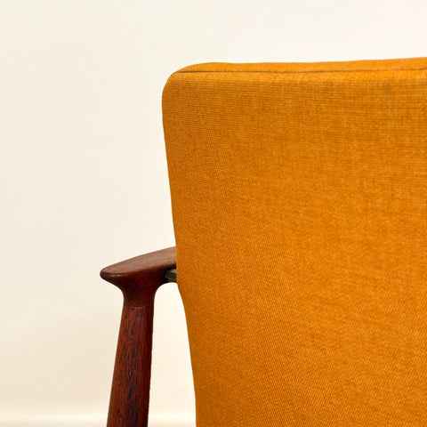 Danish armchair in solid teak