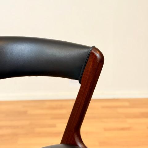 Danish dining chairs in walnut by Kai Kristiansen