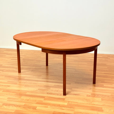 Swedish round dining table in teak