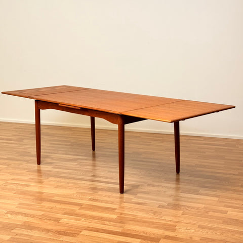 Danish dining table with in teak