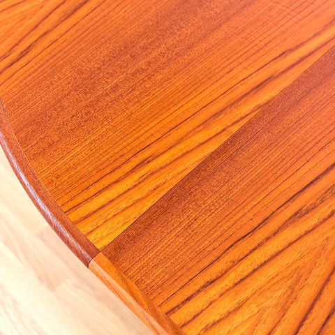 Danish round dining table in teak