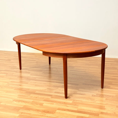 Danish round dining table in teak