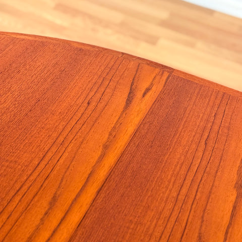 Danish round dining table in teak