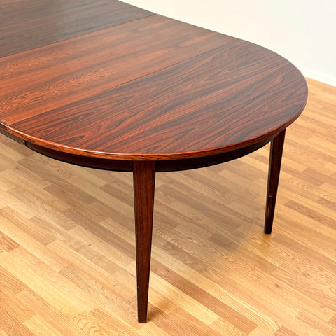 Danish round dining table in Santos rosewood