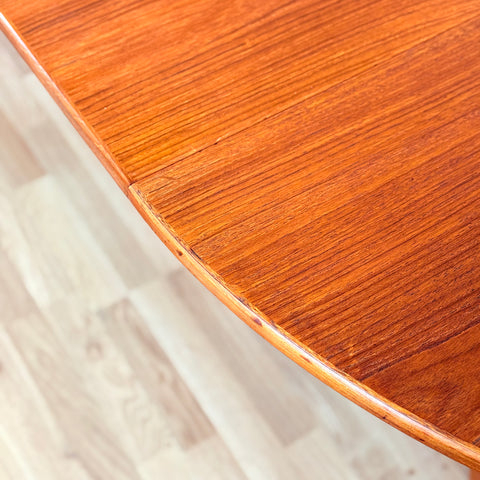 Danish round dining table in teak