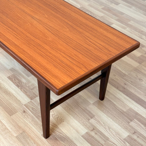 Danish coffee table in teak & walnut