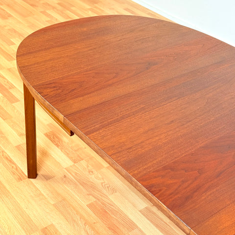 Swedish oval dining table in walnut by Bertil Fridhagen