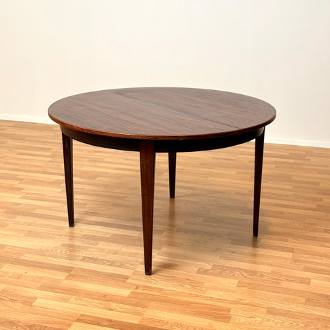 Danish round dining table in Santos rosewood