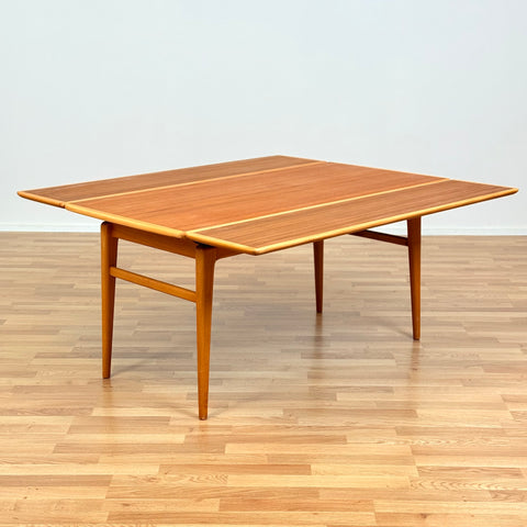 Swedish extandable coffee table in teak & beech