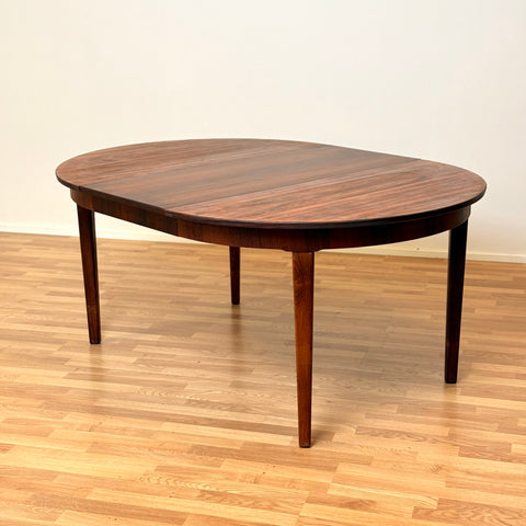 Danish round dining table in Santos rosewood