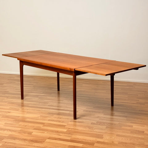Danish dining table in teak by Henning Kjærnulf for Vejle furniture factory