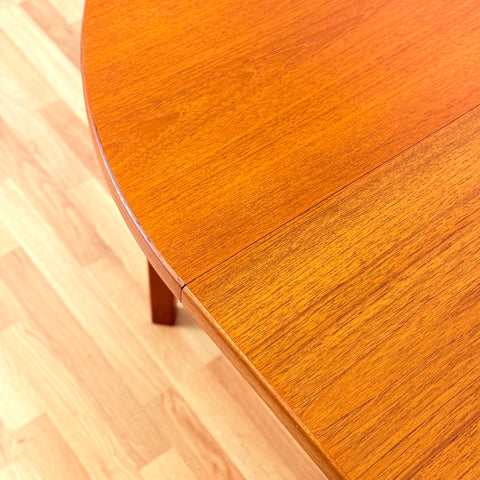 Swedish round dining table in teak