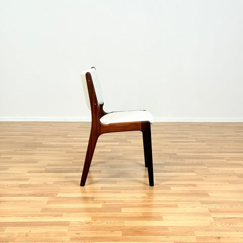 Danish dining chairs in solid walnut by Erik Buch
