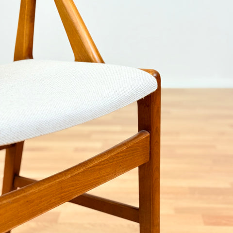 Danish single dining chair in teak by Henning Kjærnulf