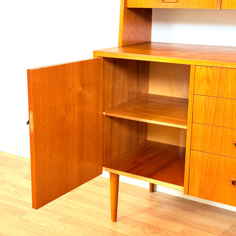 Reserved Swedish bookshelf with writing desk in teak