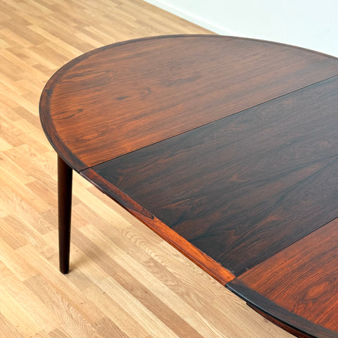 Danish round dining table in Santos rosewood