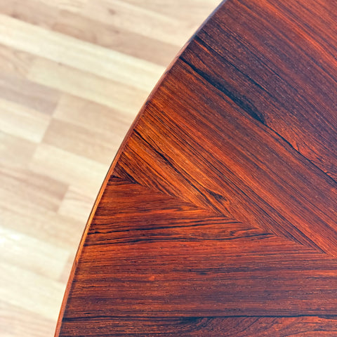 Danish round dining table in Santos rosewood