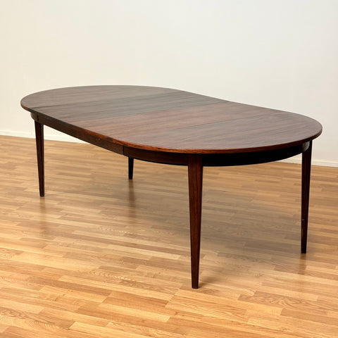 Danish round dining table in Santos rosewood