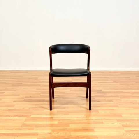 Danish dining chairs in walnut by Kai Kristiansen