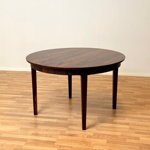 Danish round dining table in Santos rosewood
