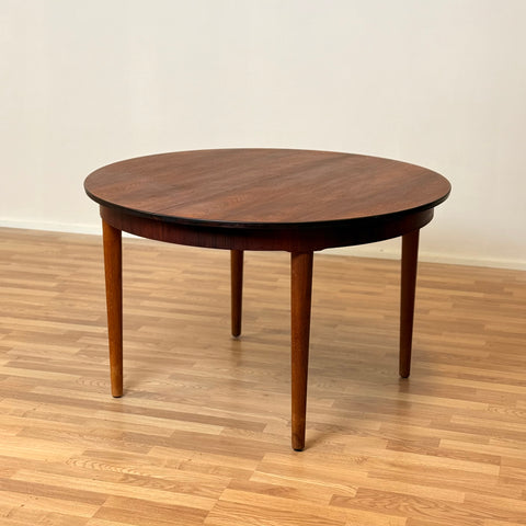 Danish round dining table in Santos rosewood