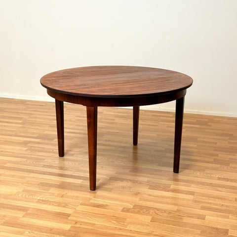 Danish round dining table in Santos rosewood