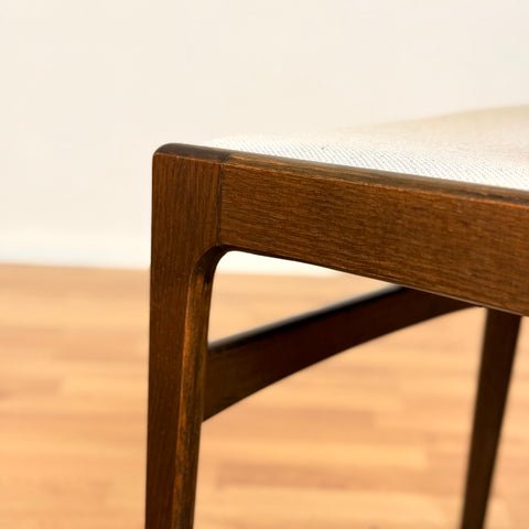 Danish dining chairs in solid stained oak by Erik Buch