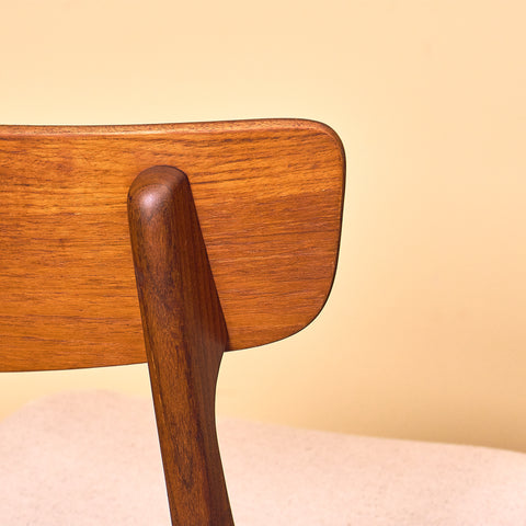 Danish dining chairs in teak and walnut by Schiønning & Elgaard