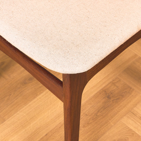 Danish dining chairs in teak and walnut by Schiønning & Elgaard
