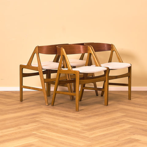 Danish dining chairs in teak and beech by Henning Kjaernulf for Vejle Stole & Møbelfabrik