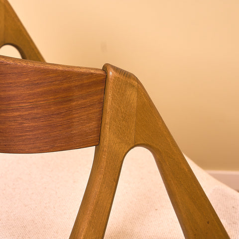 Danish dining chairs in teak and beech by Henning Kjaernulf for Vejle Stole & Møbelfabrik