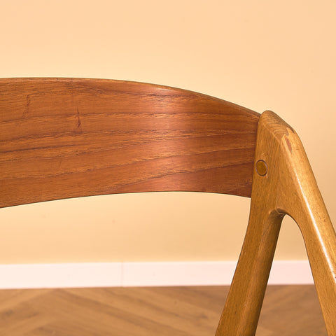 Danish dining chairs in teak and beech by Henning Kjaernulf for Vejle Stole & Møbelfabrik