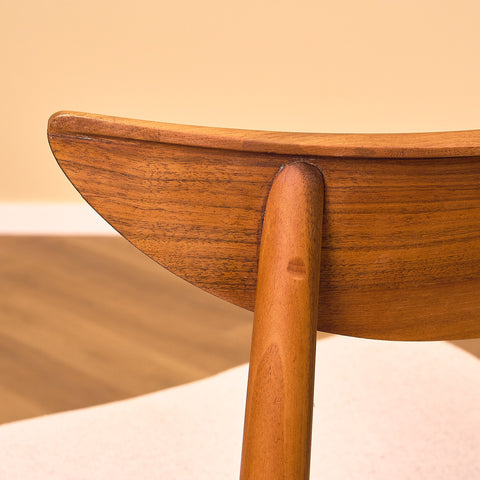 Single danish dining chairs in walnut by Harry Østergaard