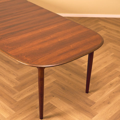 Danish oval dining table in Santos rosewood by Skovmand & Andersen