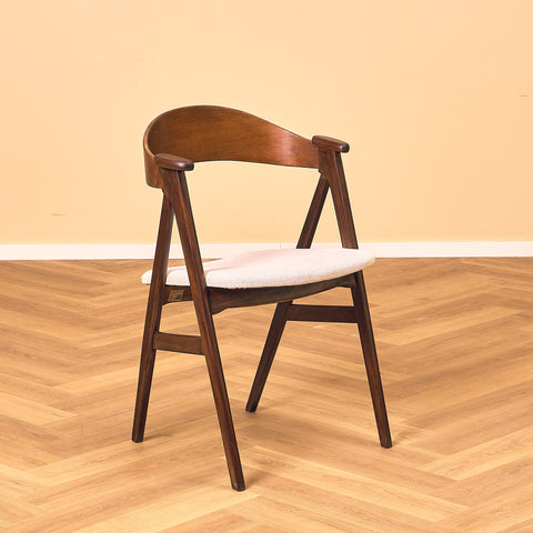 Danish dining chairs in stained teak by Kai Kristiansen